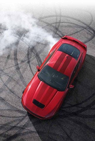 Overhead view of a 2024 Ford Mustang® model with tire tracks on pavement | Freedom Ford Greenville by Ed Morse in Greenville TX